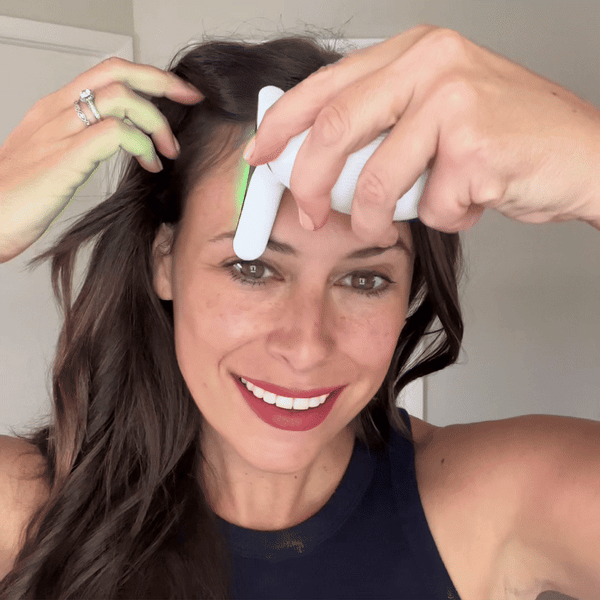 Massajador facial de luz vermelha